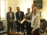 تقدیر از همکار برادر شهید در هفته دولت با حضور فرماندار